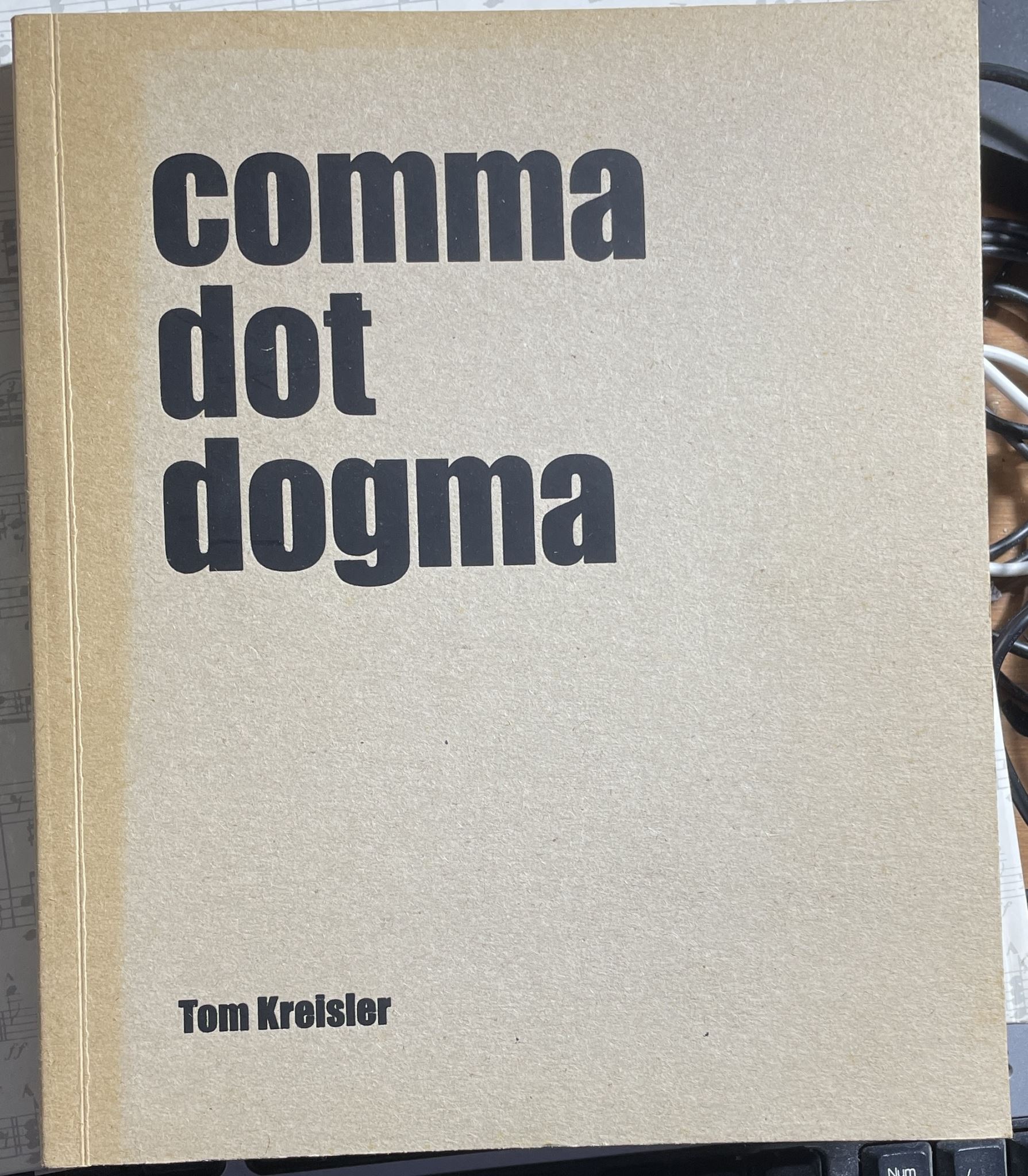 Comma Dot Dogma by Tom Kreisler