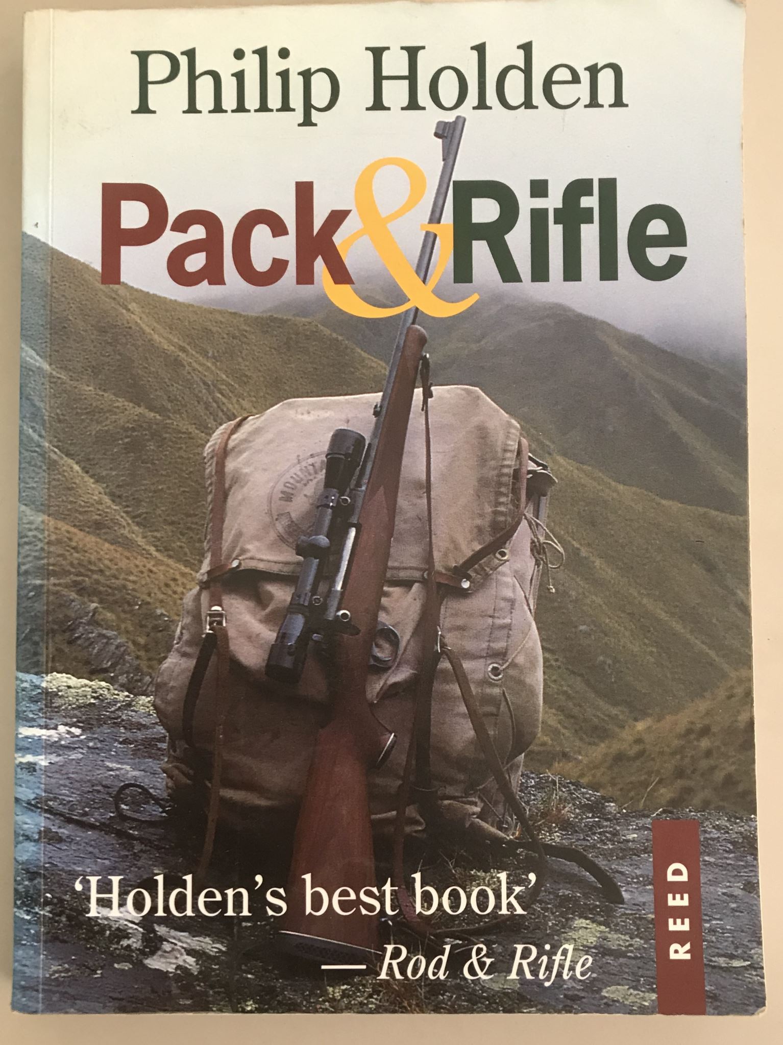 Pack and Rifle by Philip Holden