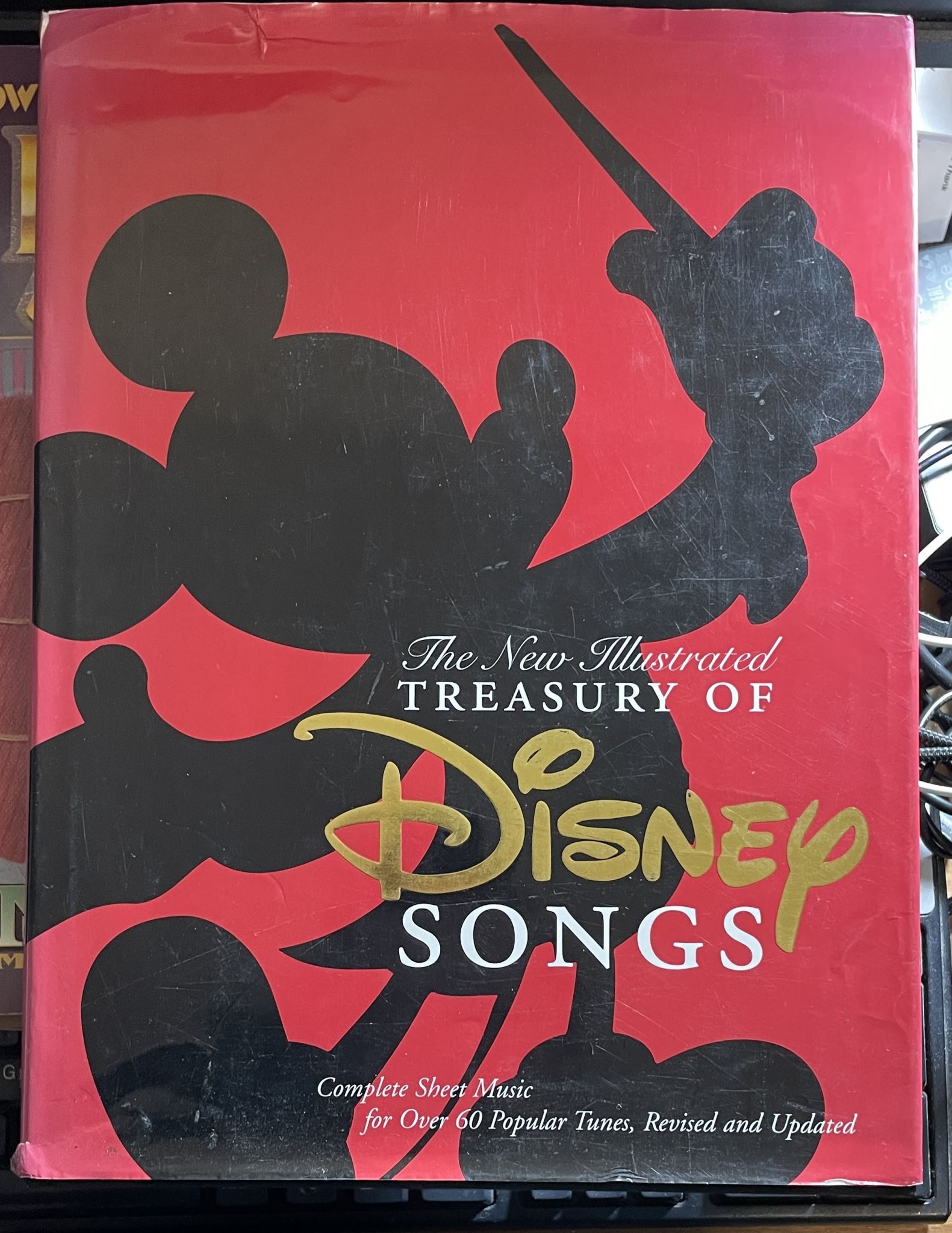 The New Illustrated Treasury of Disney Songs Complete Sheet Music for Over 60